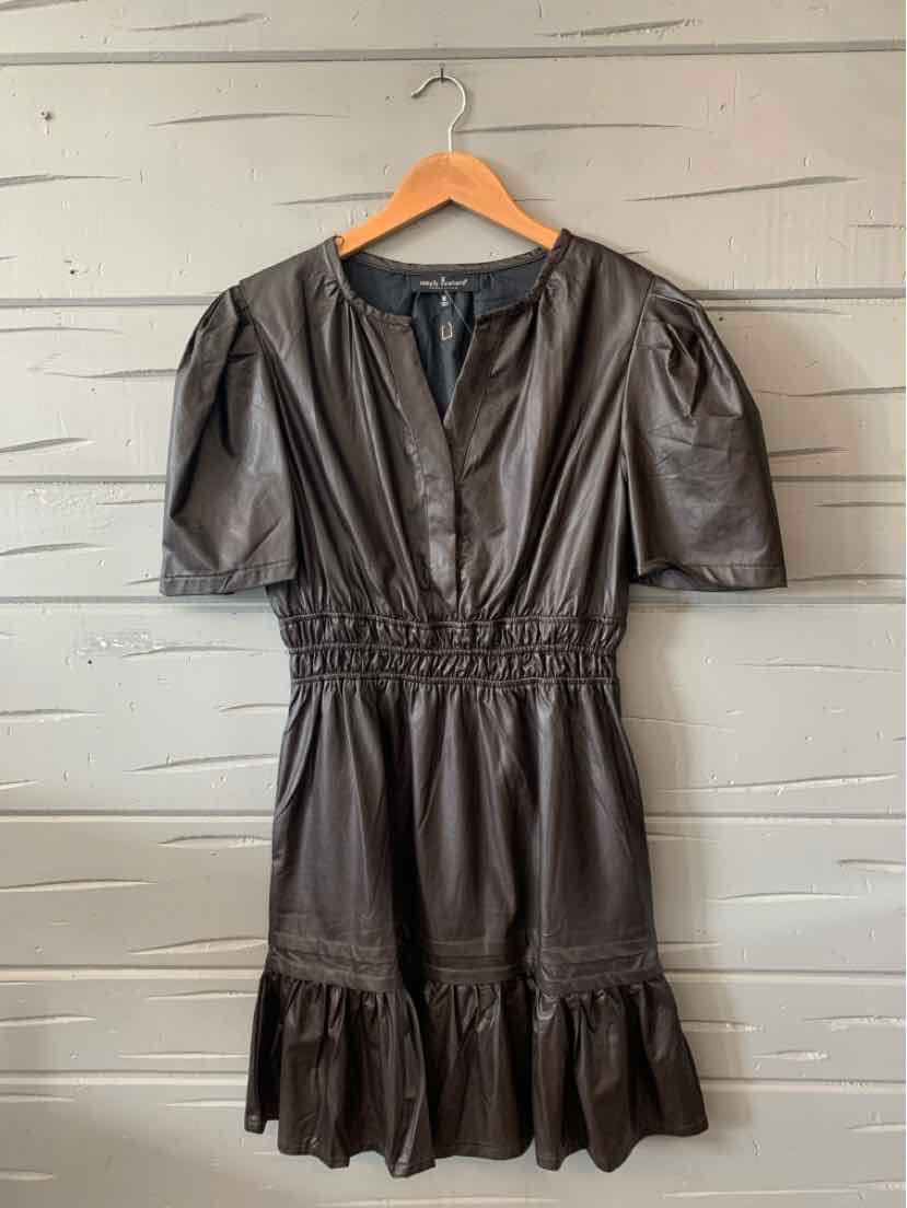 Medium brown faux leather dress with short puff sleeves, elastic waist, and ruffled hem.