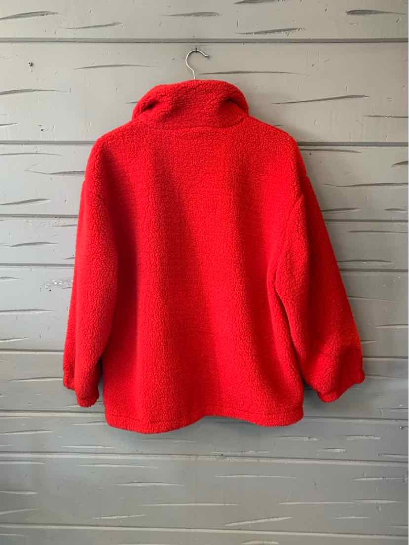 Bright red fleece pullover with a high collar, long sleeves, and a relaxed fit.