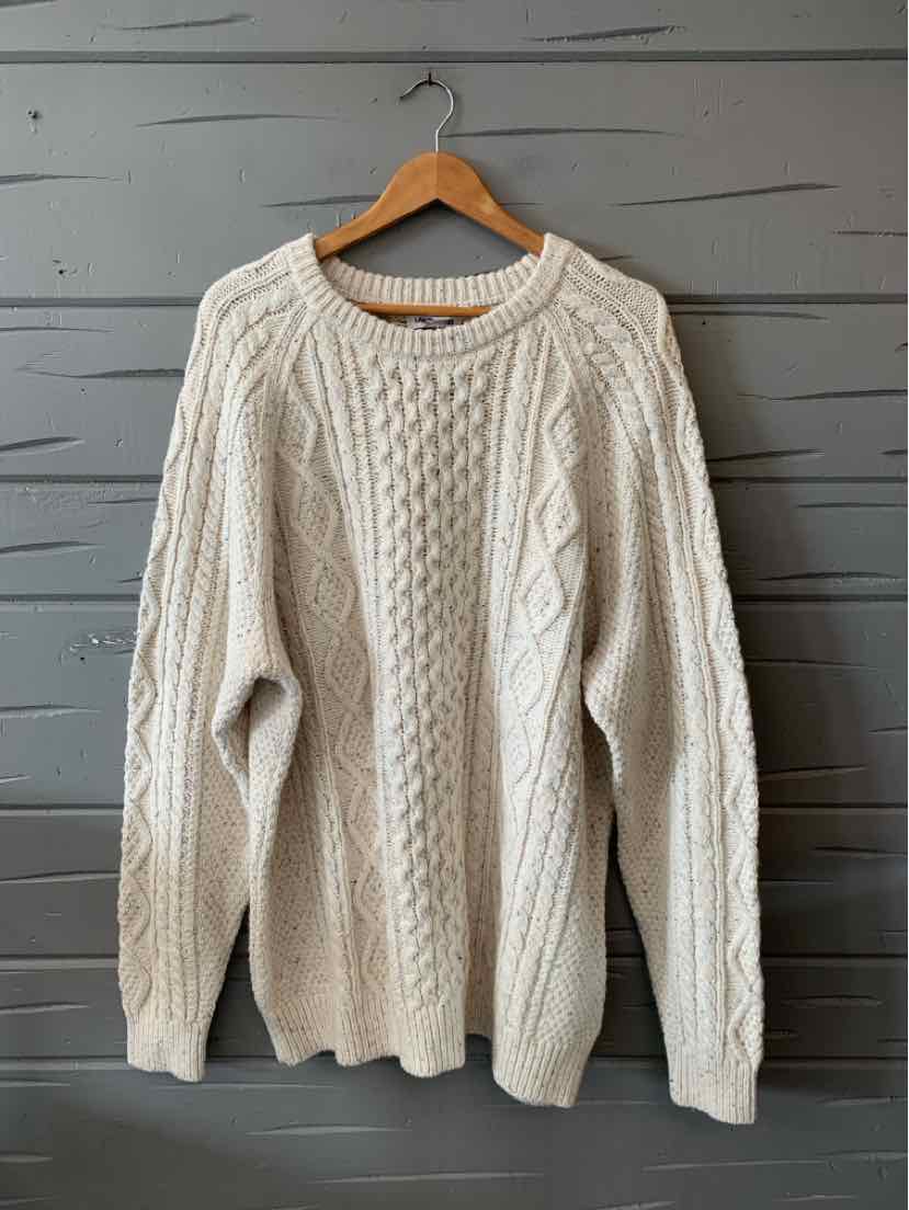 Oatmeal-colored cable knit sweater with crew neckline and long sleeves, size XXL.