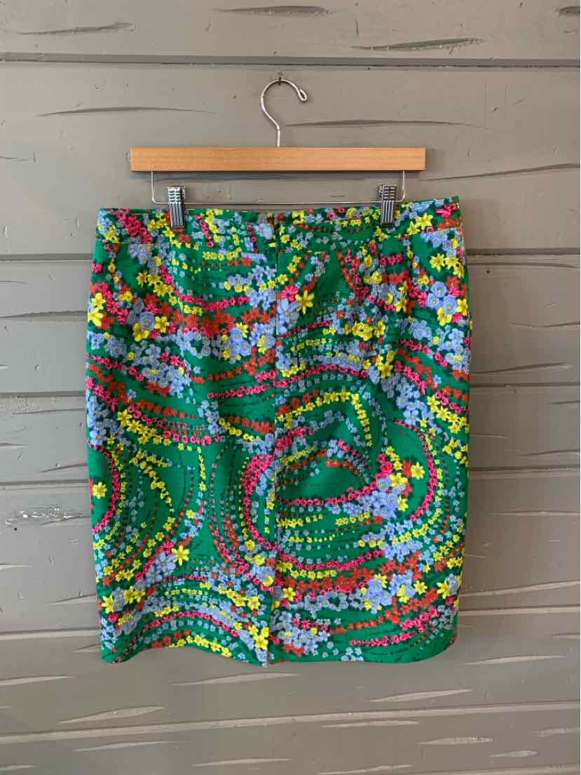 Green floral print skirt with multicolor small flowers, straight cut, size 14.