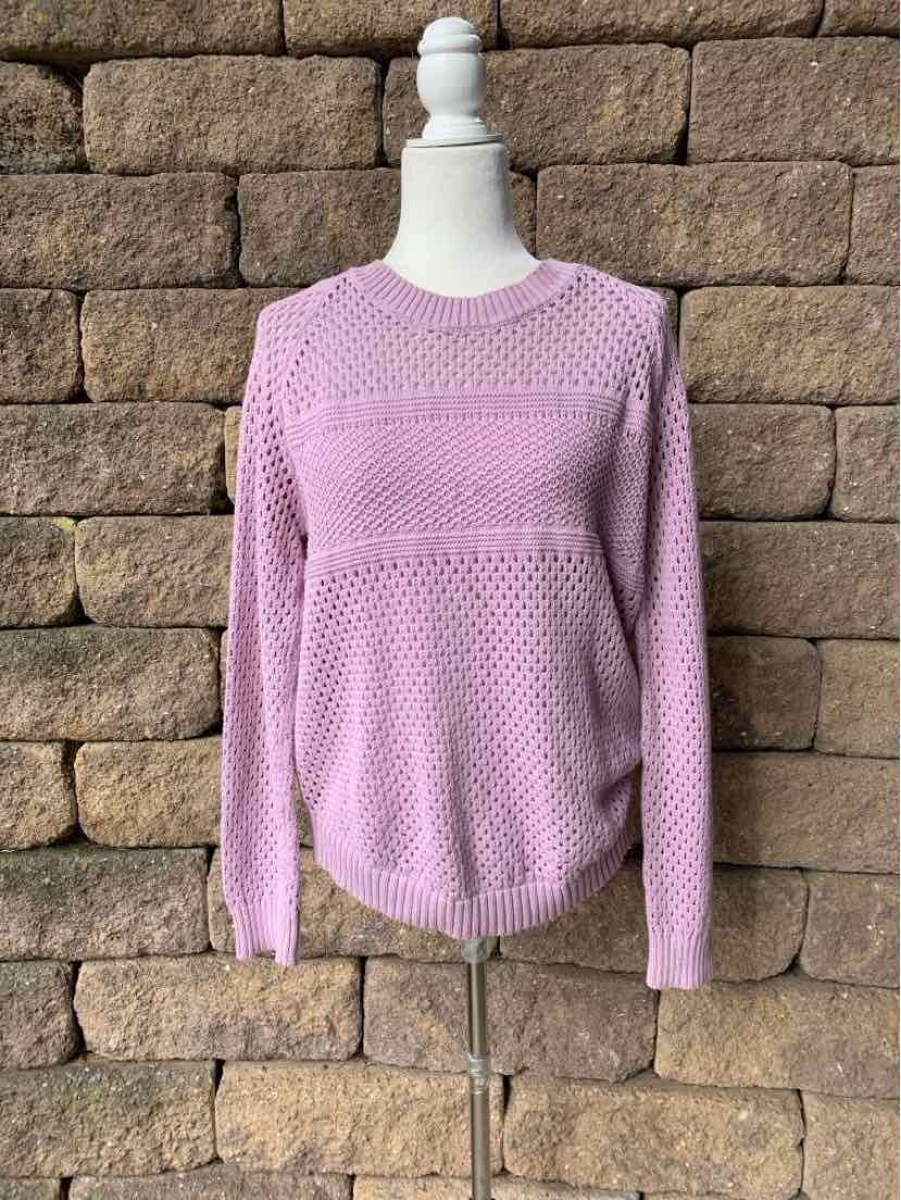 Mauve long-sleeve knit sweater with textured stitch pattern and crew neckline on a white mannequin.