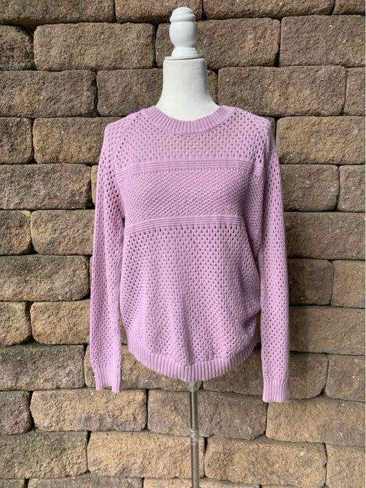 Mauve long-sleeve knit sweater with textured stitch pattern and crew neckline on a white mannequin.