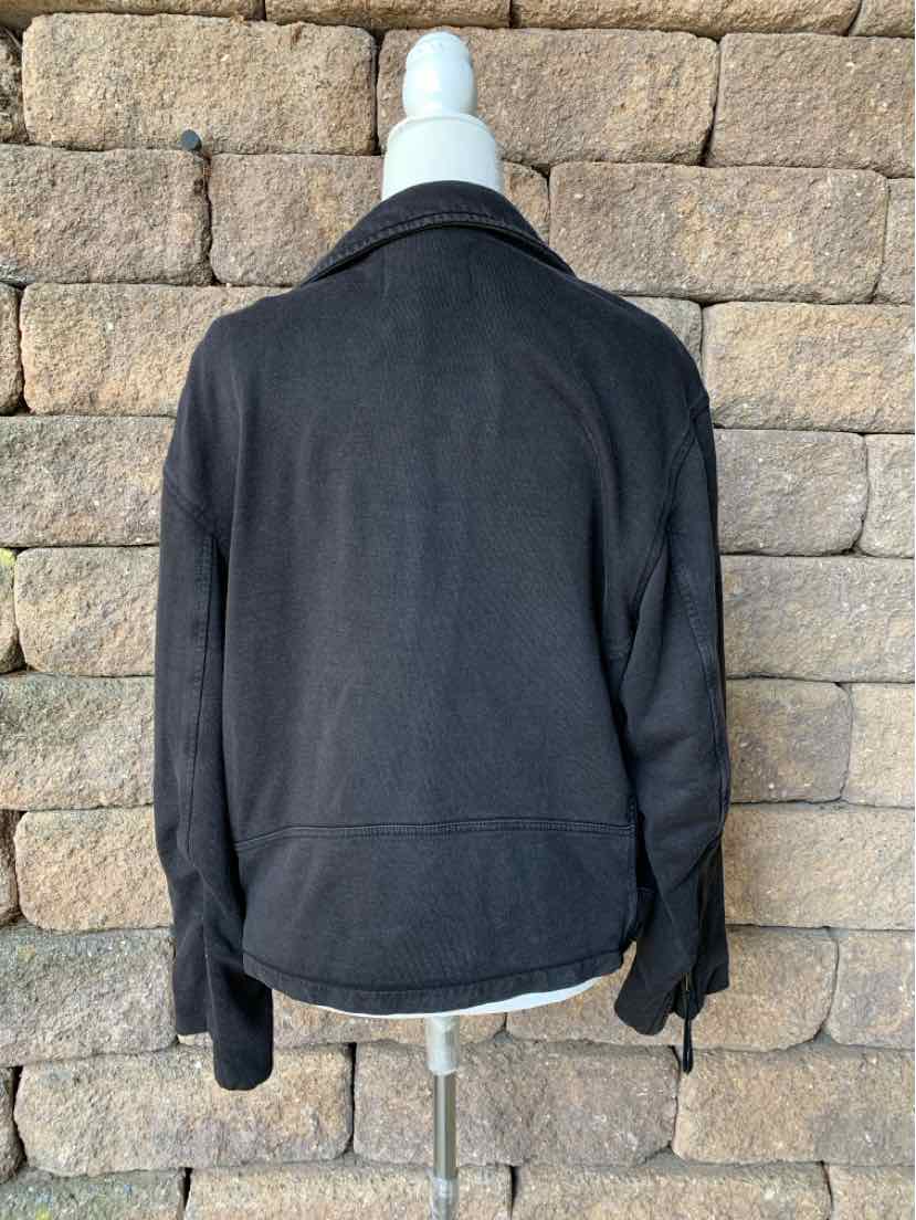Black long-sleeve jacket with collar and structured seam detailing, size small.