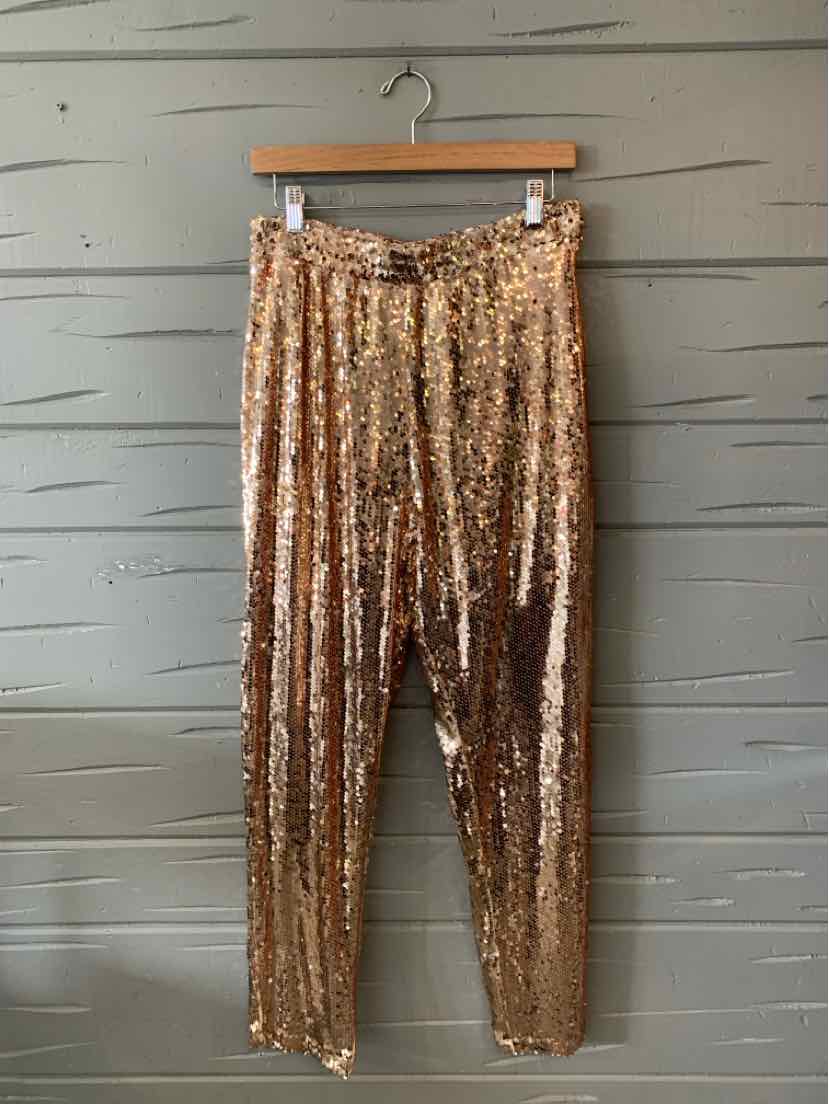 Gold sequin high-waisted tapered pants with an elastic waistband and drawstring in medium size.