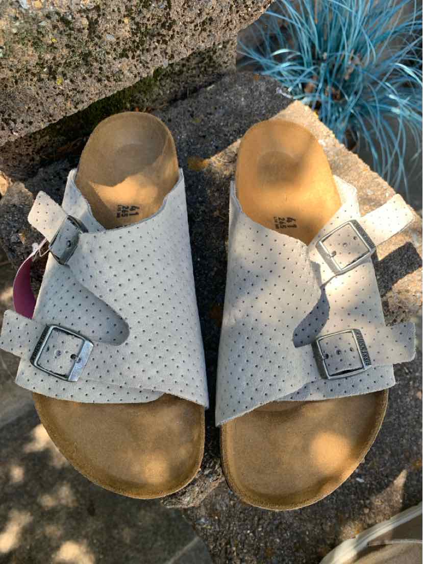 Beige Birkenstock sandal in size 41 with two adjustable buckle straps and cork footbed.