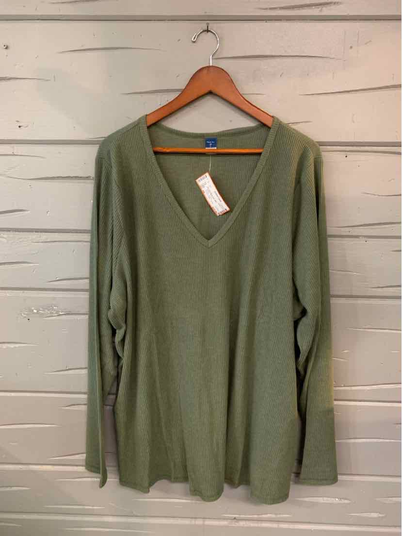 Olive green long-sleeve V-neck knit sweater with relaxed fit hanging on wooden hanger.