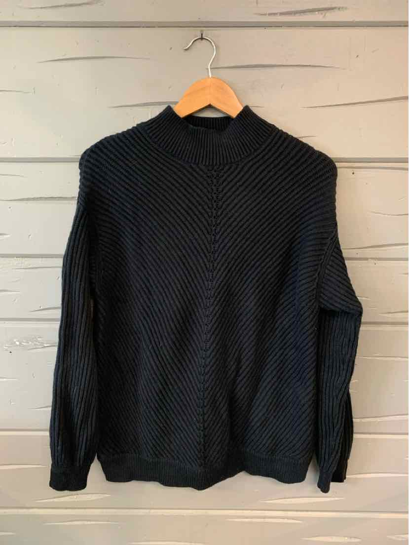 Black knit pullover sweater with a subtle diagonal ribbed pattern and a mock neck collar.