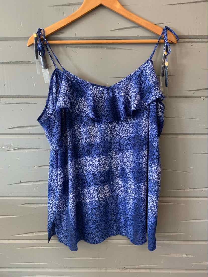 Blue floral sleeveless blouse with ruffle detail and adjustable tie straps.