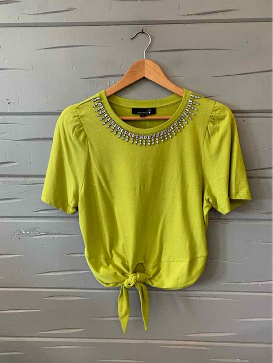 Lime green short-sleeve blouse with rhinestone-embellished neckline and front tie detail.