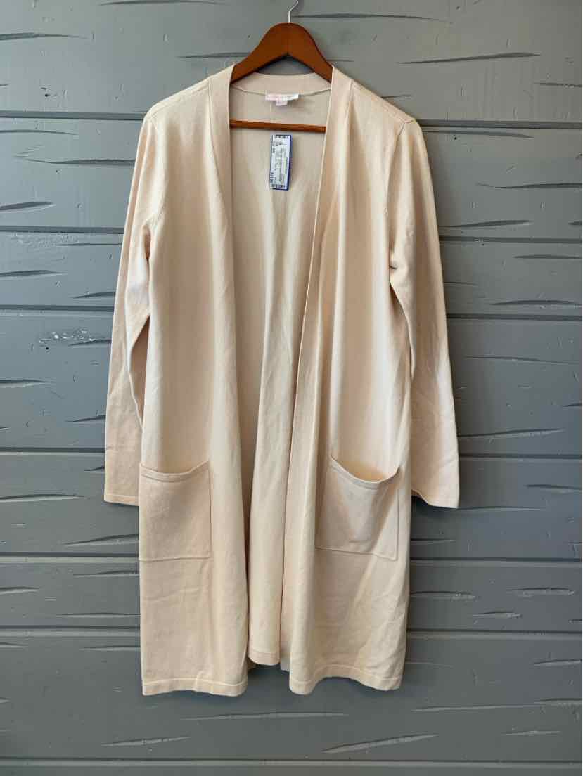 Light beige long open-front cardigan with long sleeves and two front pockets, lightweight fabric.