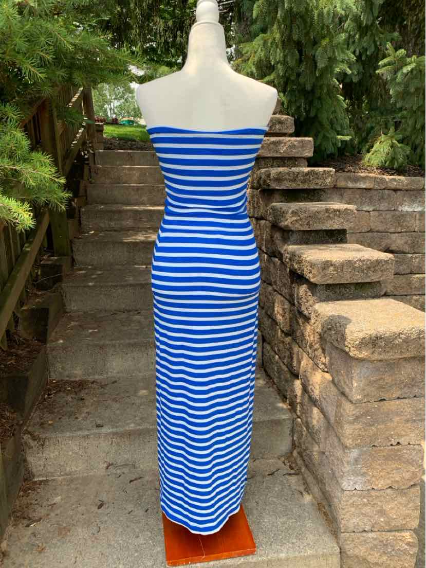 Blue and white horizontal striped strapless maxi dress on a mannequin outdoors.