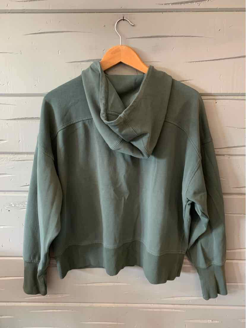 Olive green oversized hoodie with front kangaroo pocket and ribbed cuffs, XXL size.