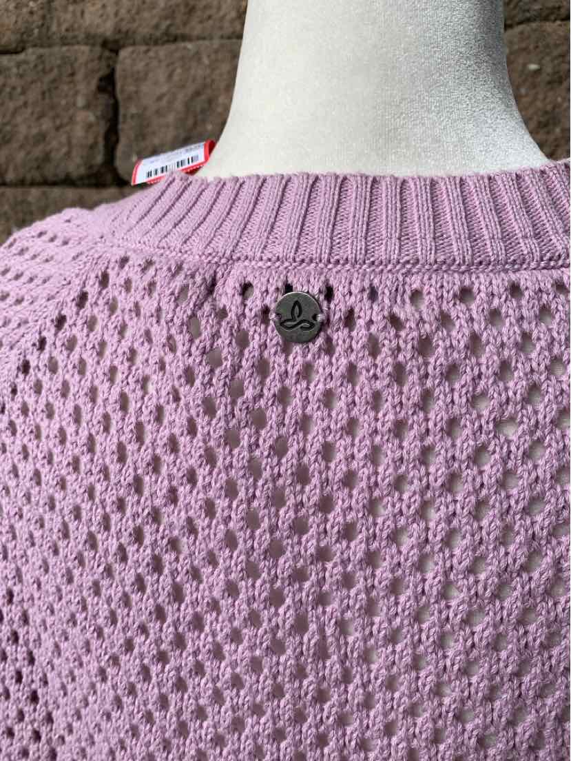 Mauve knit sweater with textured honeycomb pattern and ribbed collar detail on mannequin.