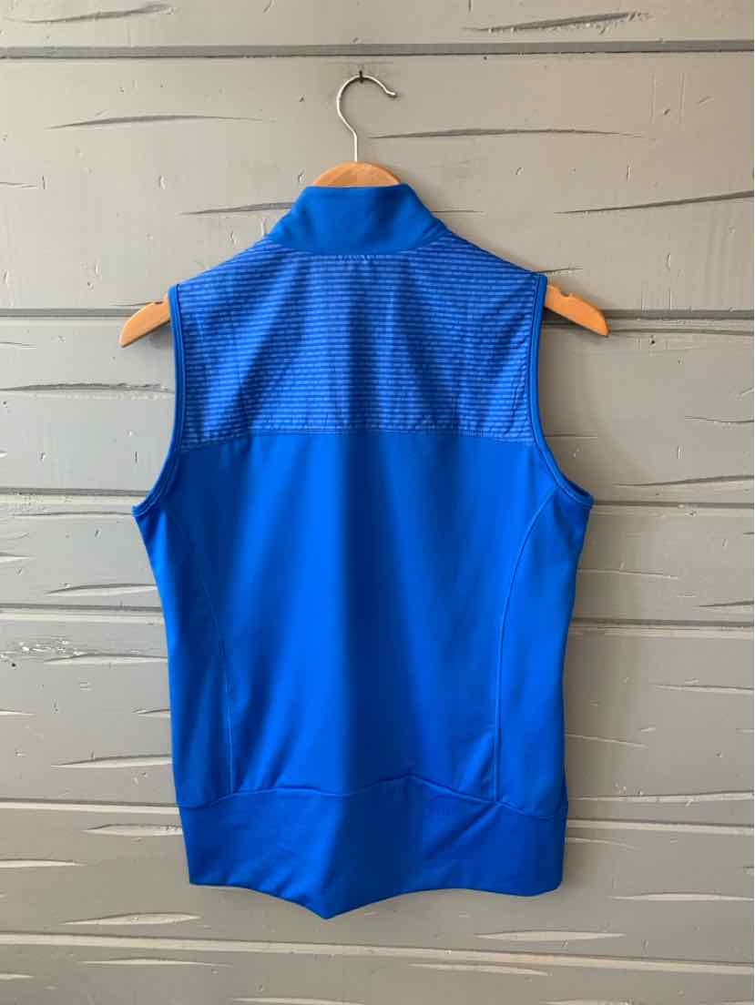 Blue sleeveless Adidas vest with mesh upper back panel hanging on wooden hanger.