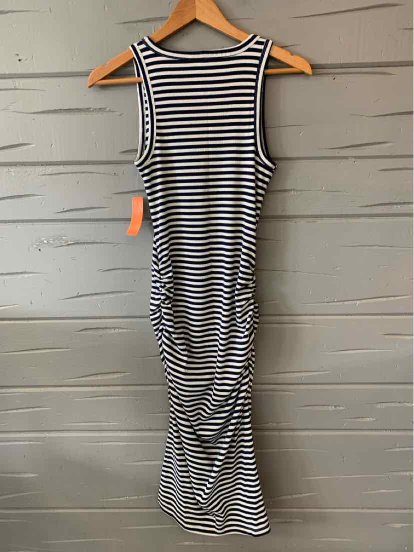 Sleeveless navy and white striped midi dress with ruched sides and scoop neckline.