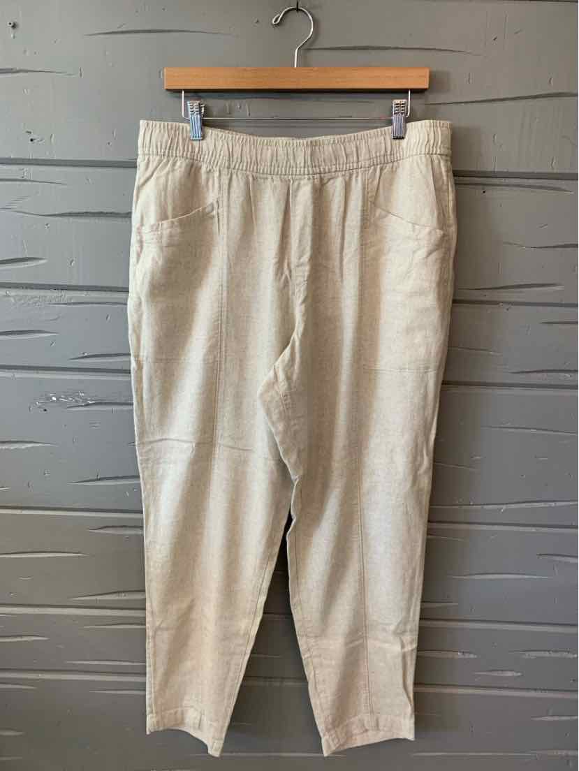 Beige Old Navy pants in size large with an elastic waistband and tapered legs.
