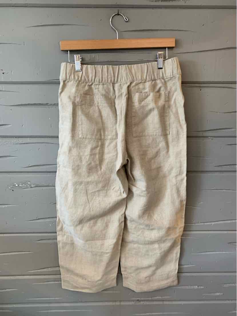 Light khaki linen pants with elastic waistband and relaxed fit, size extra small petite.