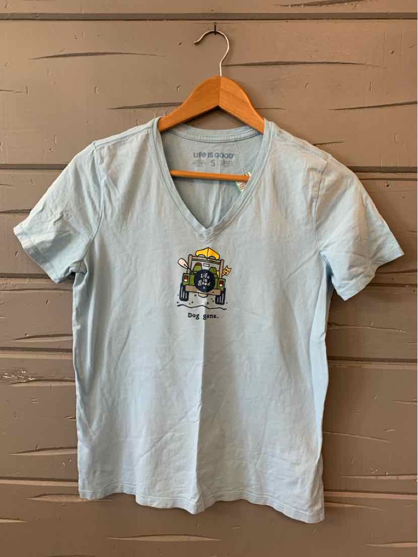 Light blue short-sleeve V-neck T-shirt with a small colorful graphic and "Life is Good" text on front center.