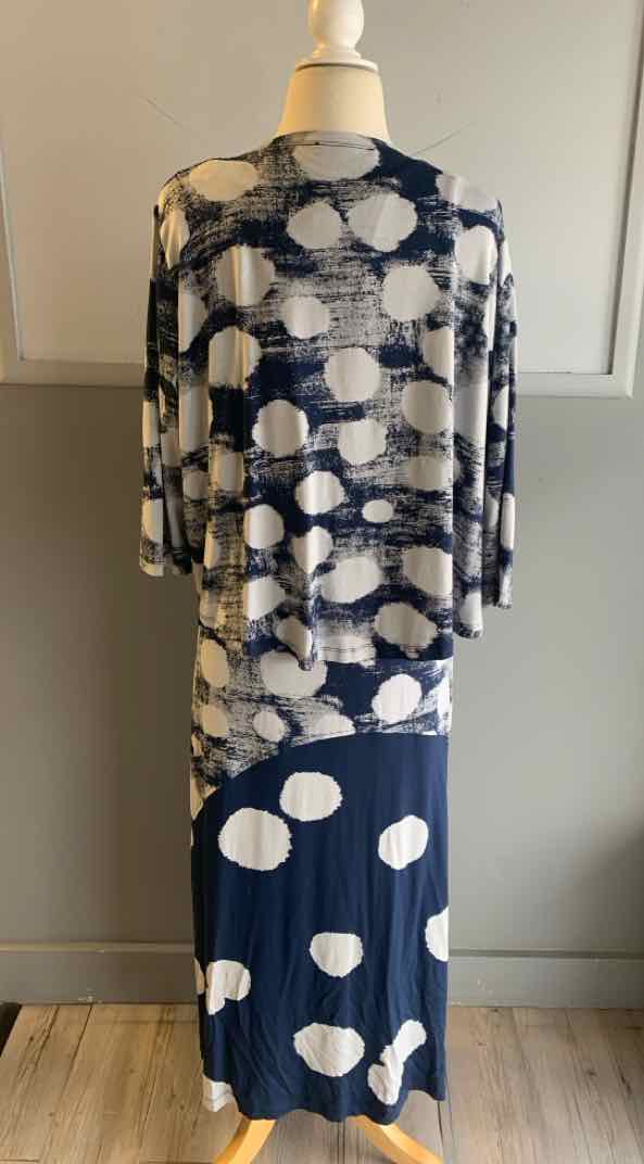 Navy and white two-piece dress with large polka dots, long-sleeve top, and ankle-length skirt in size XL.