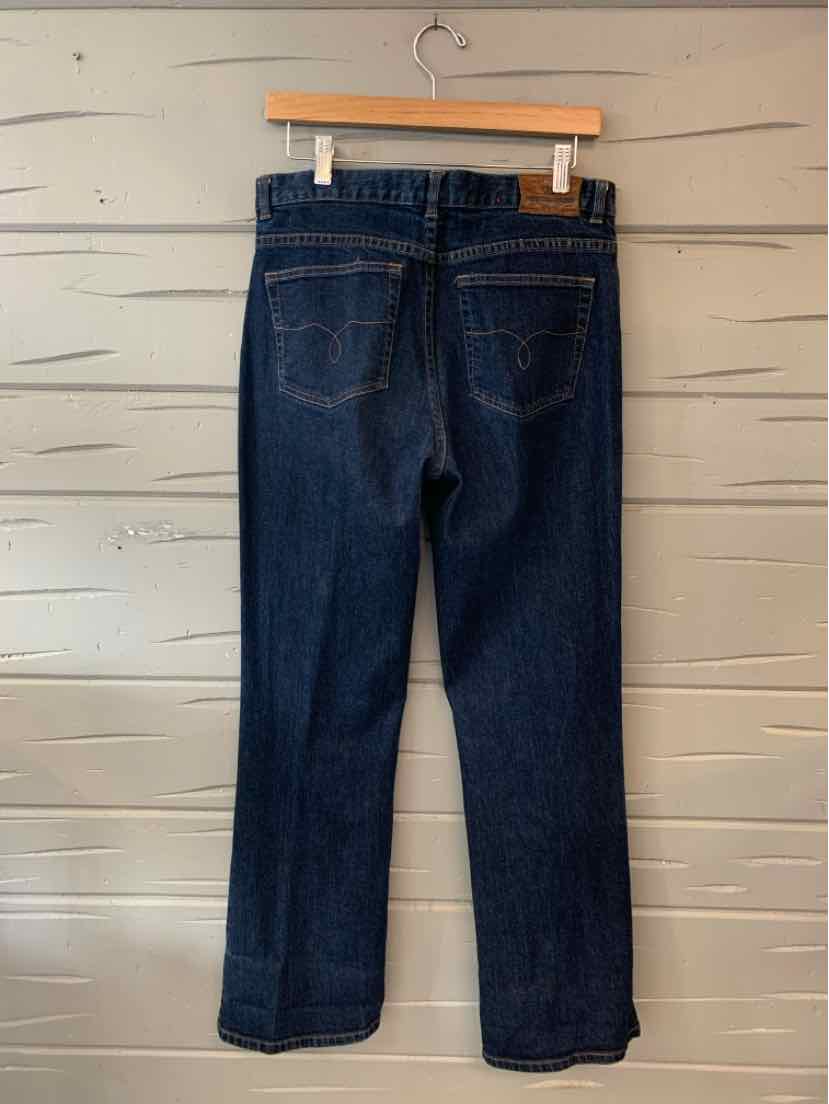 Dark blue denim jeans with straight legs, back pockets, and visible stitching.