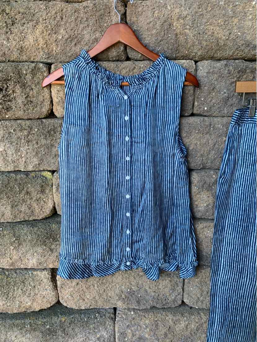 Blue sleeveless button-up blouse with vertical white stripes and a loose, flowy fit.