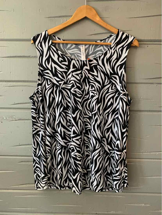 Black and white geometric patterned sleeveless blouse with scoop neckline, size large.