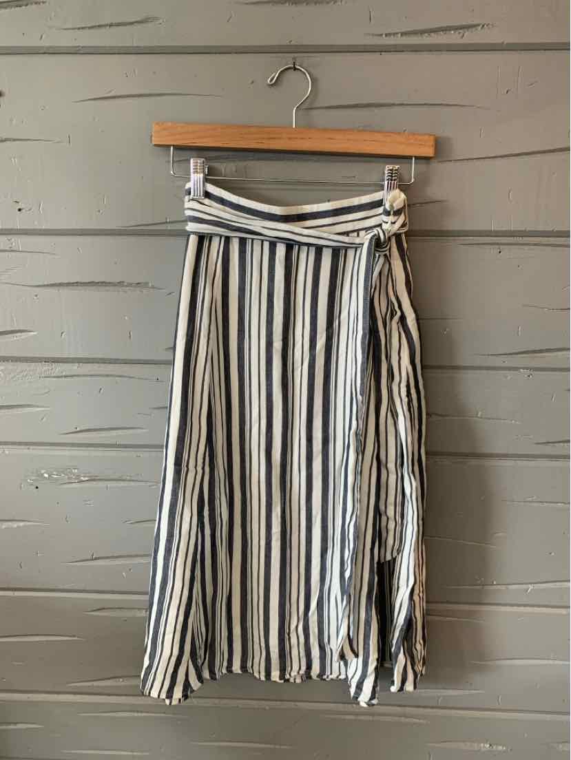 Blue and white striped midi skirt with wrap design and side tie detail.