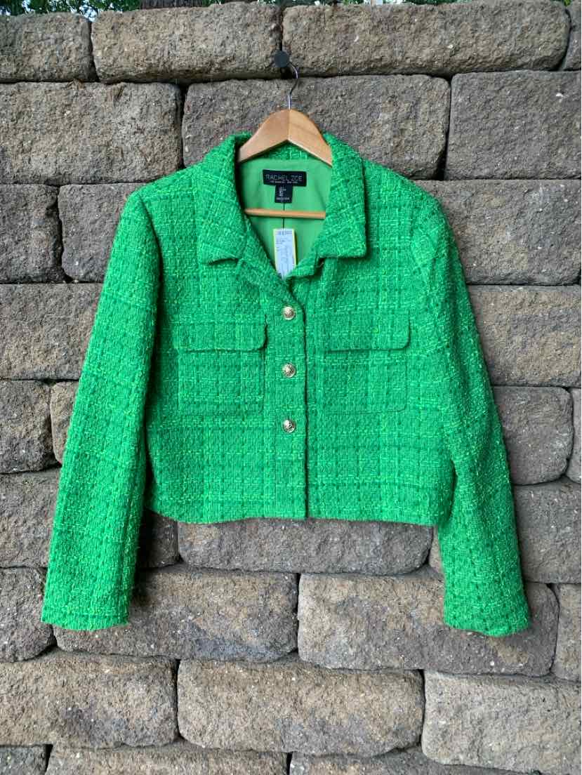 Green tweed cropped blazer with long sleeves and front flap pockets.