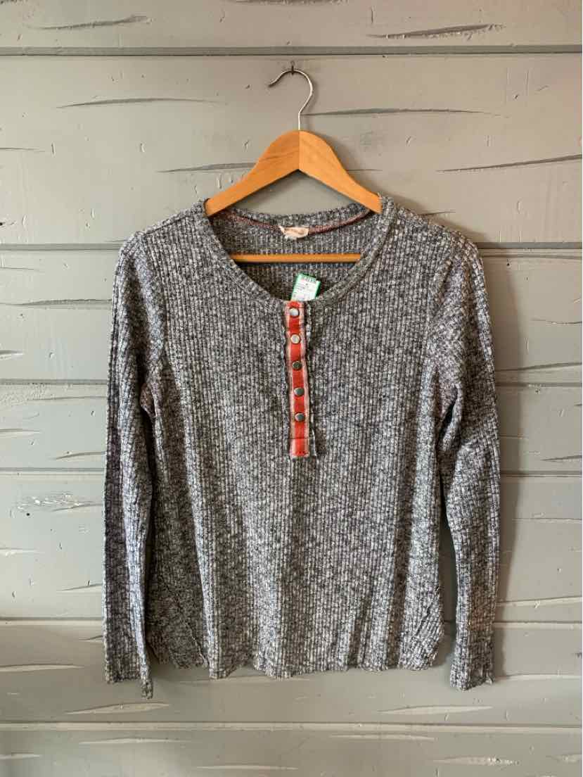Long-sleeve marled grey knit sweater with V-neck and tag detail on wooden hanger.