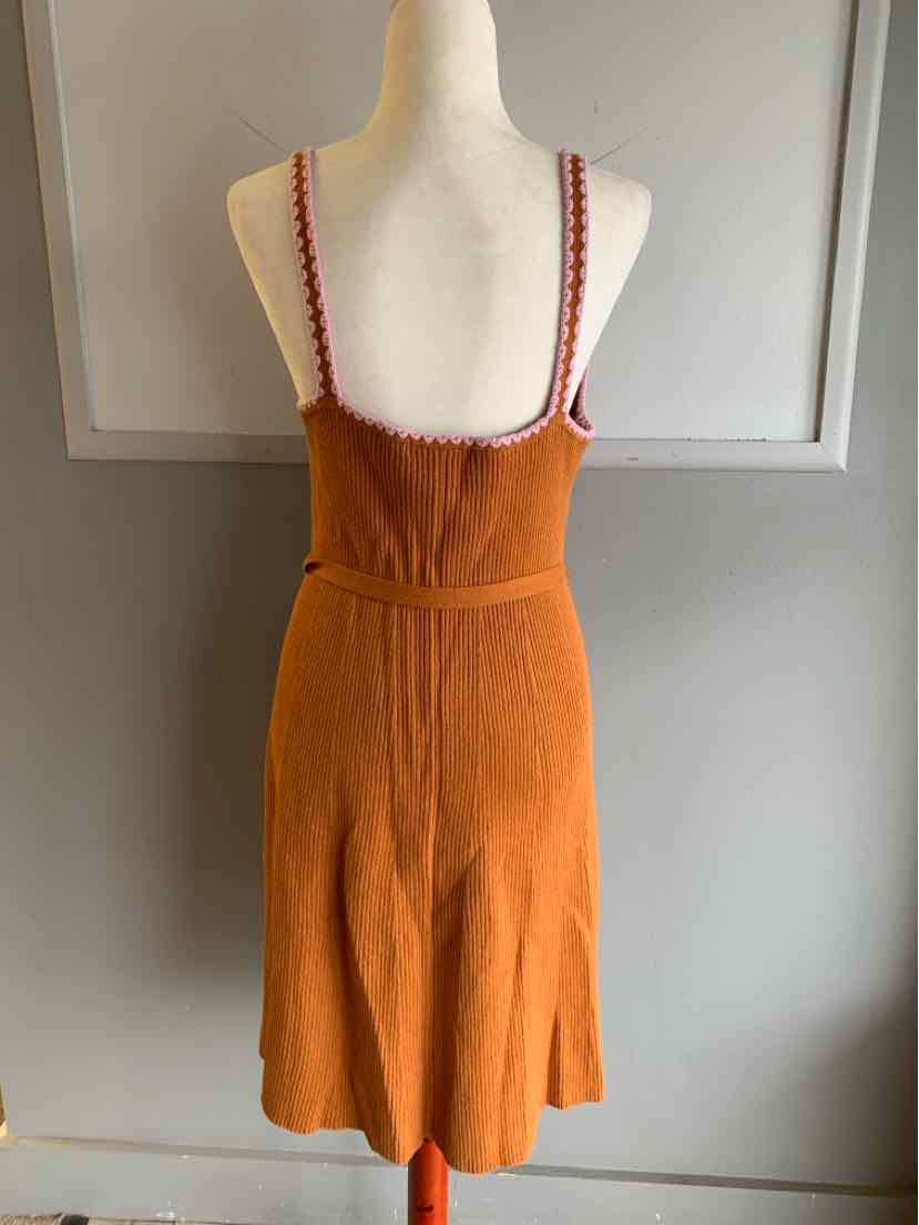 Tan knit sleeveless dress with braided straps and fitted waist, size 10L.