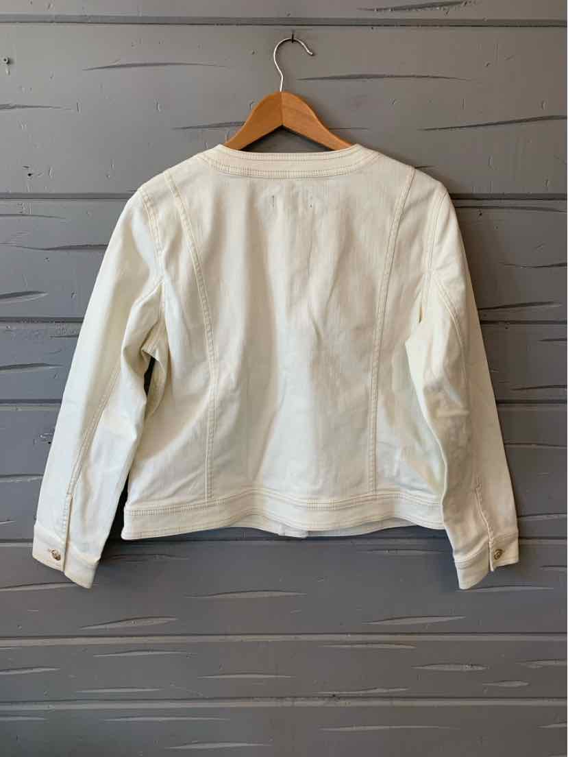 Long-sleeve cream-colored jacket with tailored seams and crew neckline on wooden hanger.