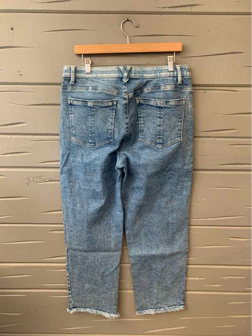 Light blue denim jeans with a slightly faded wash, frayed hems, and five-pocket design, size 12.