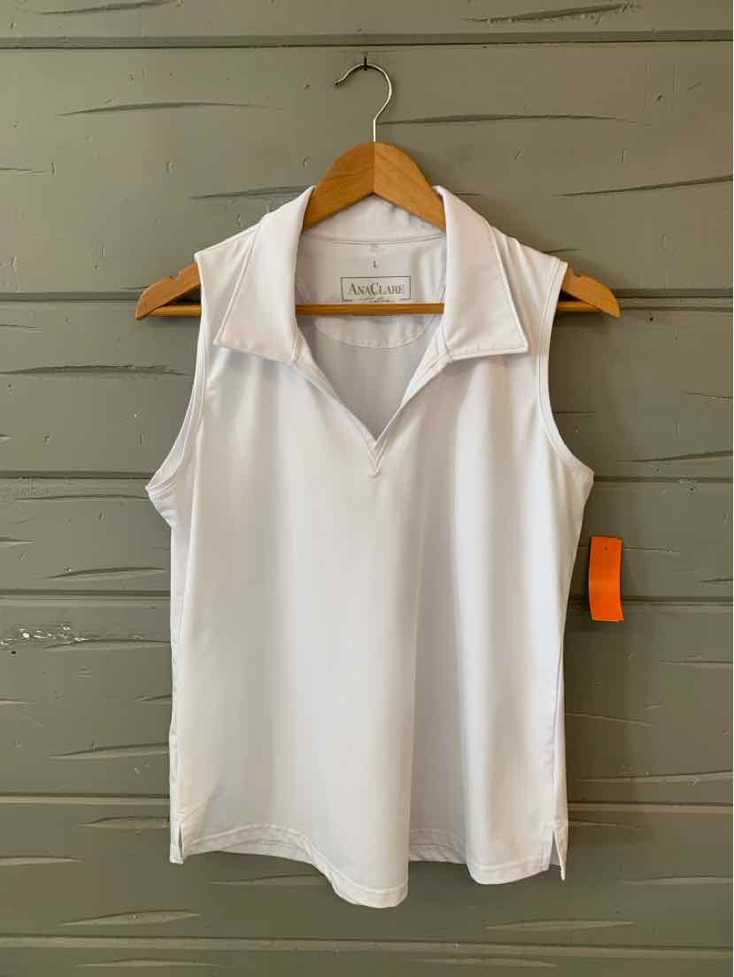 White sleeveless collared top with V-neck and relaxed fit on wooden hanger.