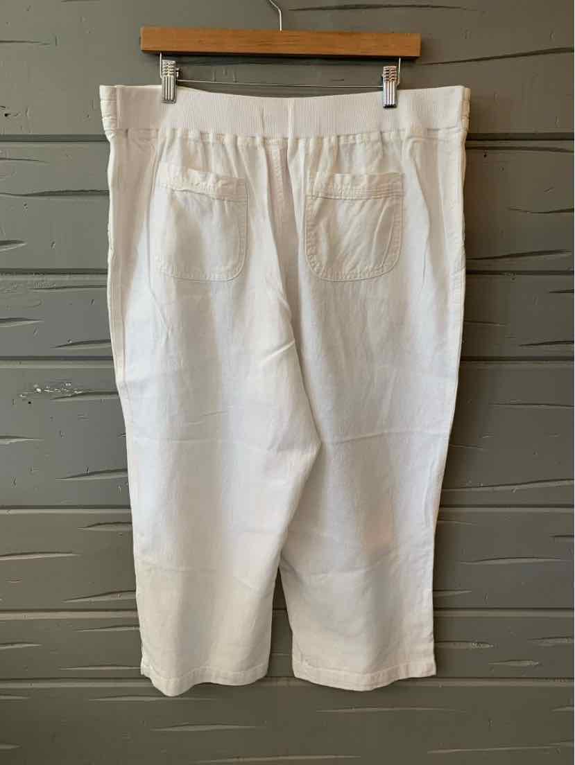 White linen blend pants with elastic waistband and back patch pockets, size XL.