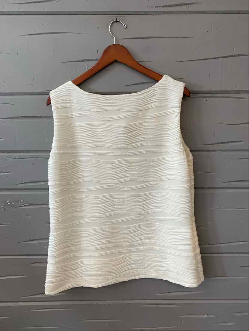 White sleeveless textured top with horizontal ribbing, round neckline, and straight hem, size XL.