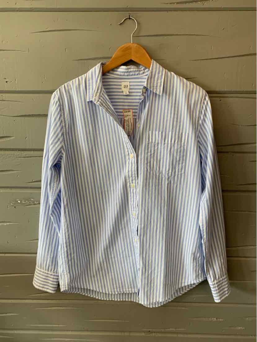 Light blue and white vertical striped button-up shirt with long sleeves and a collar hanging on wooden hanger.
