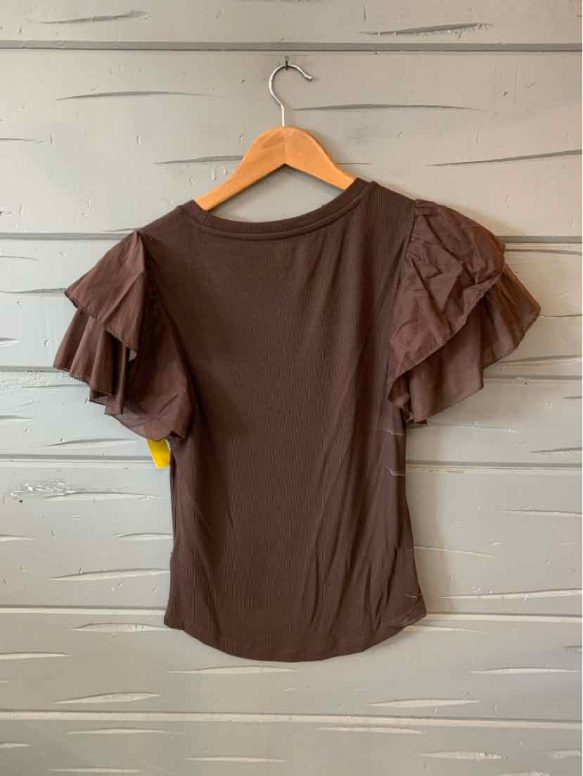 Brown short-sleeve top with layered ruffle sleeves and round neckline on wooden hanger.