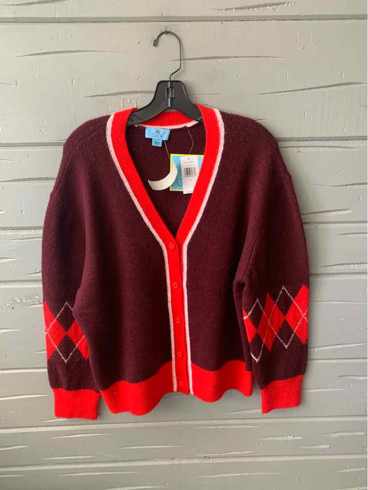 Burgundy cardigan with red and gray argyle pattern on sleeves and red trim along button closure and cuffs.