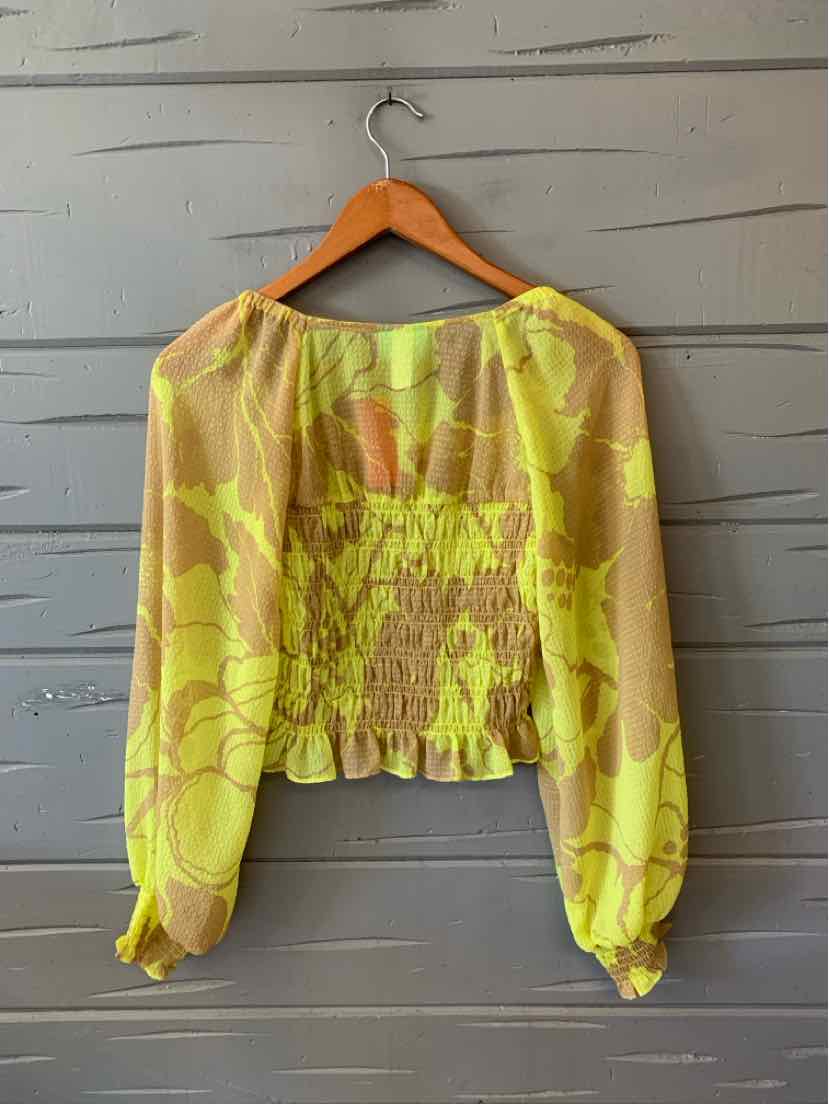 Sheer long-sleeve blouse in bright yellow with floral print, elastic smocked waist and cuffs, square neckline, size XS.