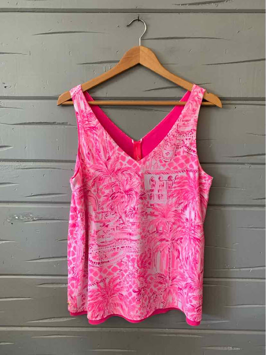 Pink sleeveless tank top with abstract white and pink pattern and V-neck, size medium.