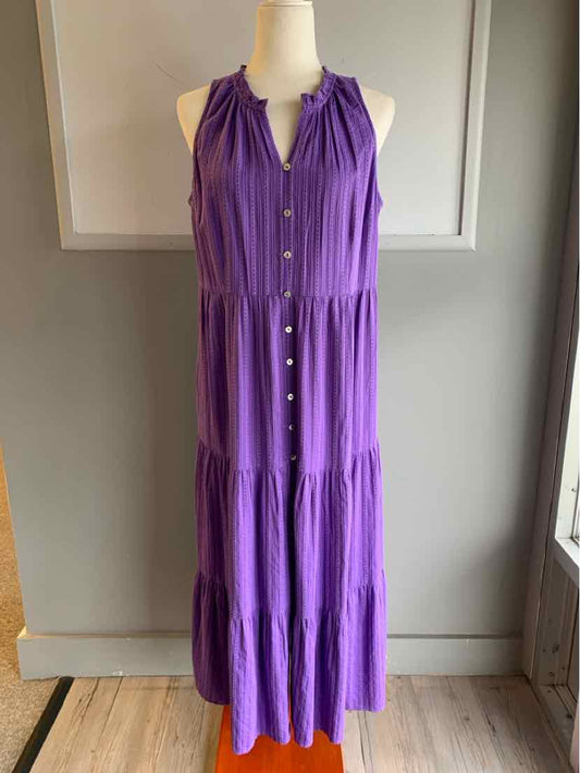 Purple sleeveless button-front maxi dress with gathered neckline and tiered skirt on mannequin.
