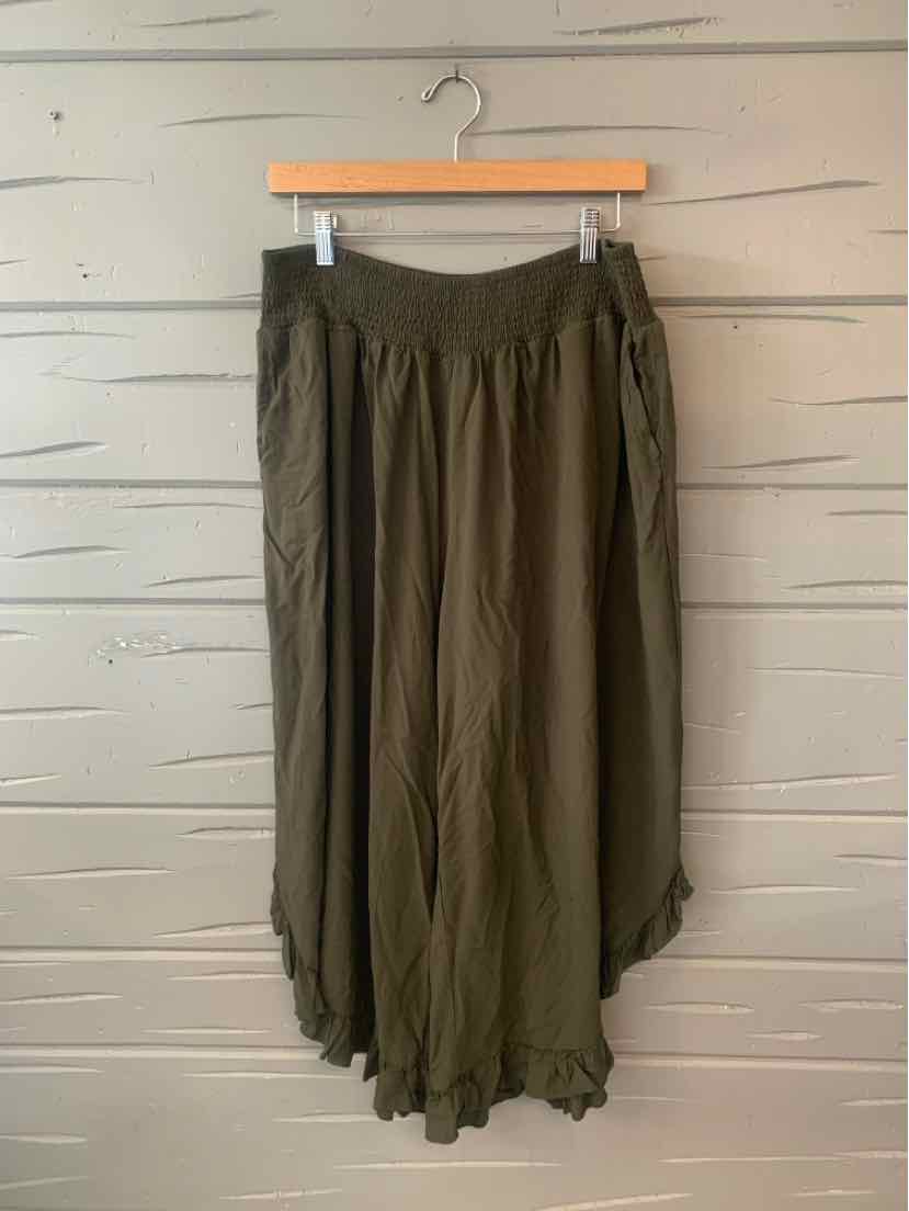 Olive green wide-leg pants with elastic waistband and flowy lightweight fabric.