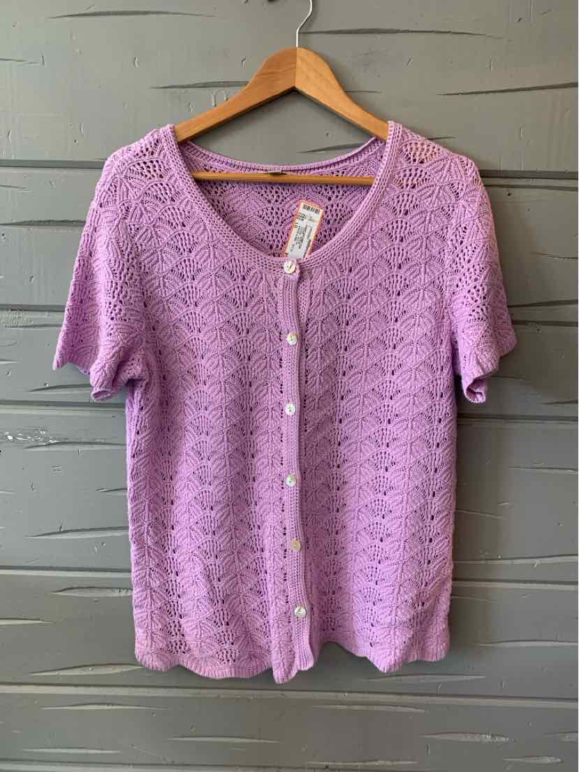 Lavender knit cardigan with short sleeves, scalloped edges, and pearly buttons down the front.