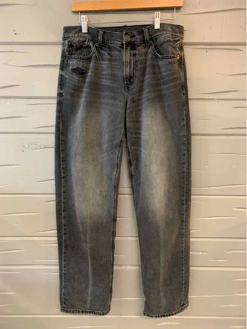 Black washed denim jeans in size 4 with a high waist and subtle fading on thighs.