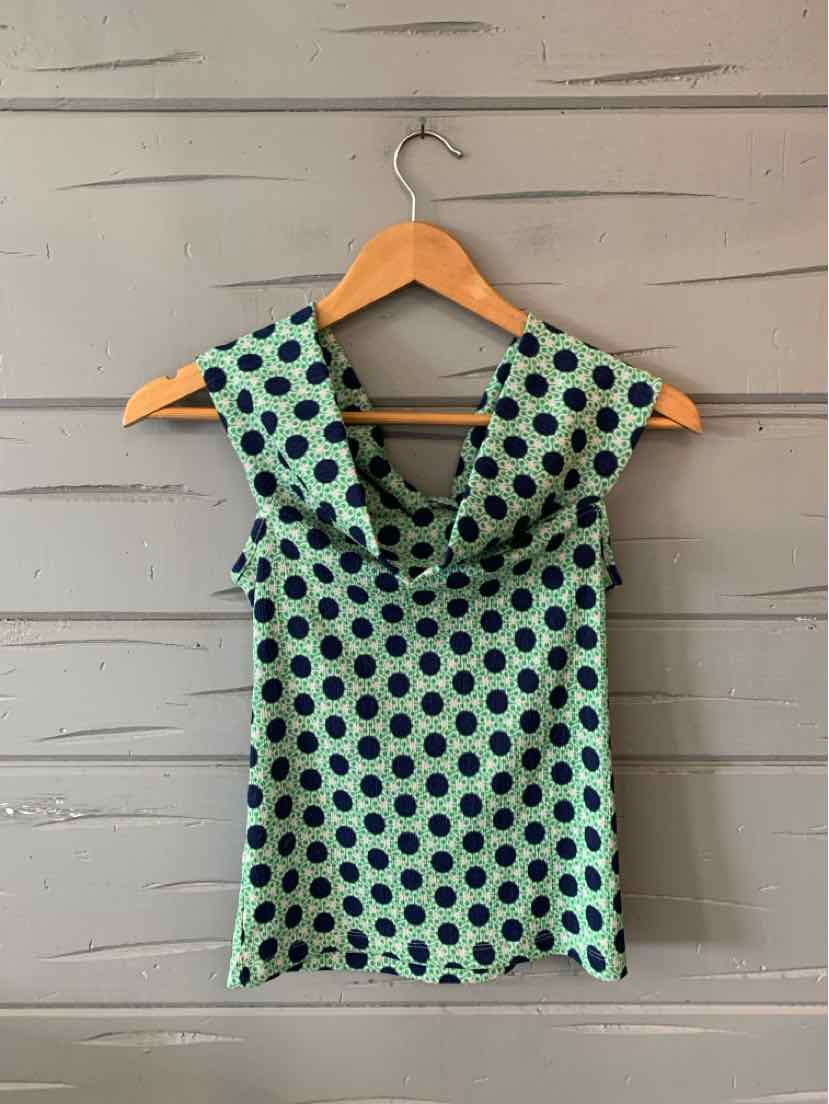 Sleeveless green top with large black polka dots and a draped neckline in size XS.
