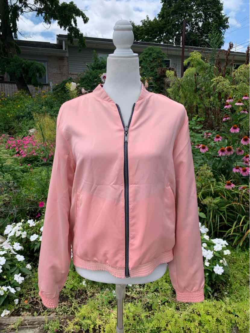 Light pink zip-up jacket with ribbed cuffs and hem, lightweight fabric, casual fit.