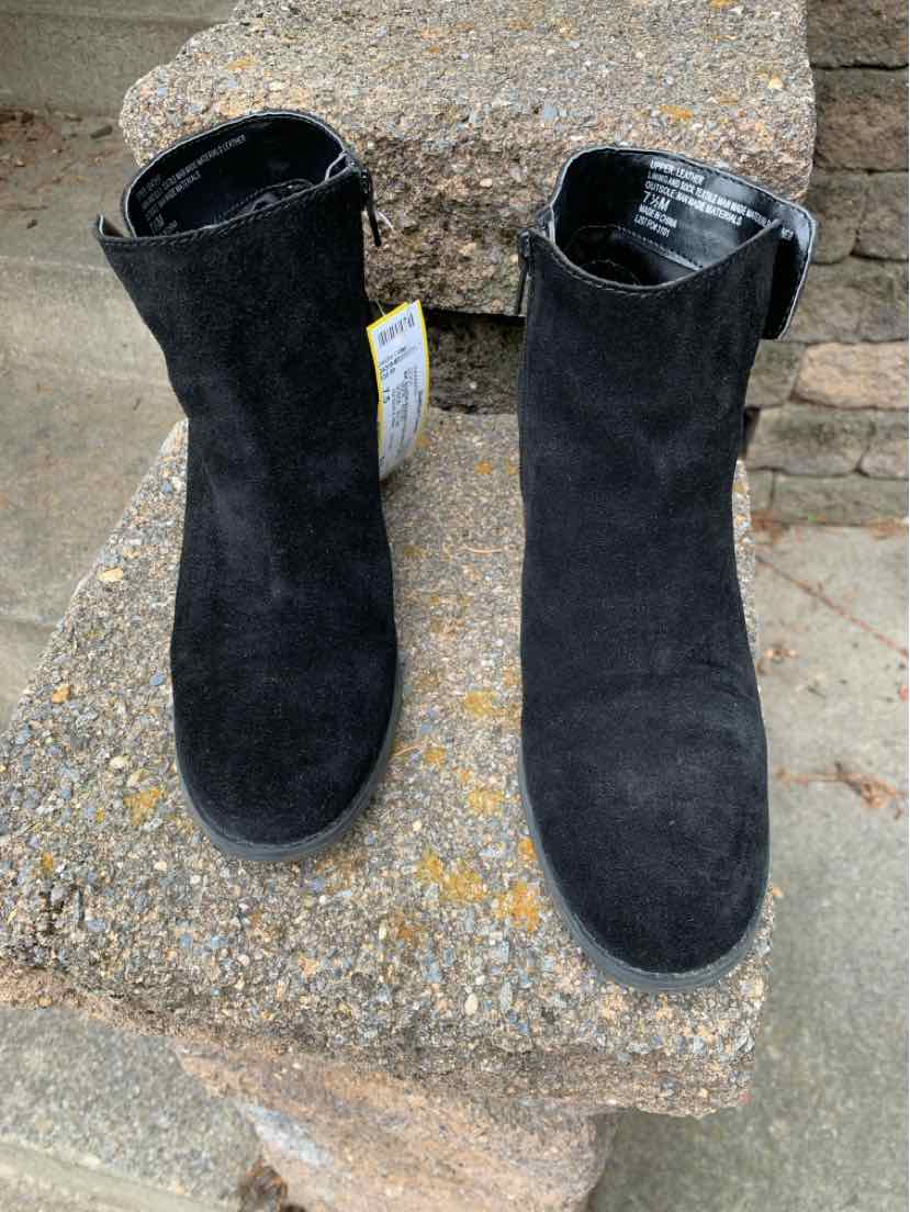Black suede ankle boots with rounded toes and side zippers, size 7.5.
