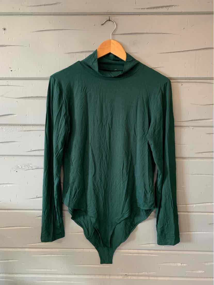 Dark green long-sleeve bodysuit with high neck and smooth fabric hanging on wooden hanger.