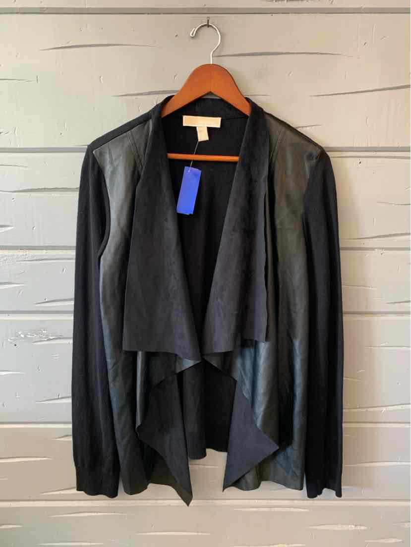 Black Michael Kors women’s open-front cardigan with long sleeves, a draped shawl collar, and soft knit fabric.
