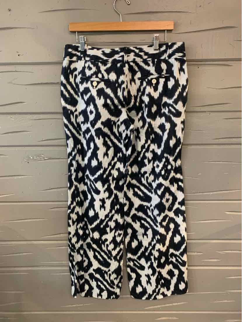 Black and white patterned straight-leg pants with waistband and belt loops, size 6.